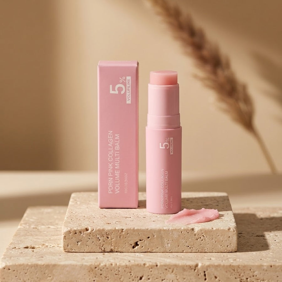 PinkGlow collageen balm stick met doosje op travertin